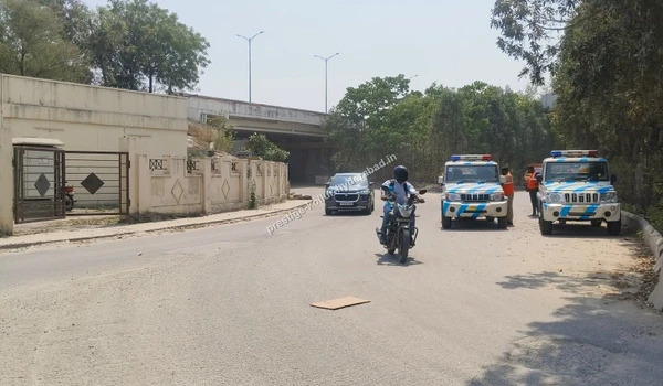 A prominent major traffic intersection featuring urban landscaping and a landmark central structure, facilitating excellent connectivity for Prestige Kollur Hyderabad via the Nehru Outer Ring Road as of March 03 , 2026.