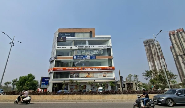 Street perspective of the nearby dental and medical facilities ensuring wellness for residents of Prestige Kollur in Hyderabad