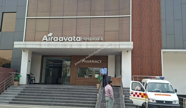Front entrance of Airaavata Hospitals with an ambulance on standby, ensuring emergency medical support for Prestige Kollur in Hyderabad
