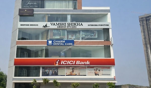 View of Charm Dental Care and other commercial services located in close proximity to Prestige Kollur in Hyderabad