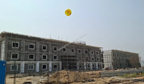 Construction progress of the new Sri Chaitanya campus ensuring quality education near Prestige Kollur in Hyderabad