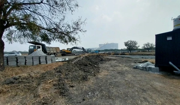 Heavy machinery and earthworks at the Prestige Kollur development site